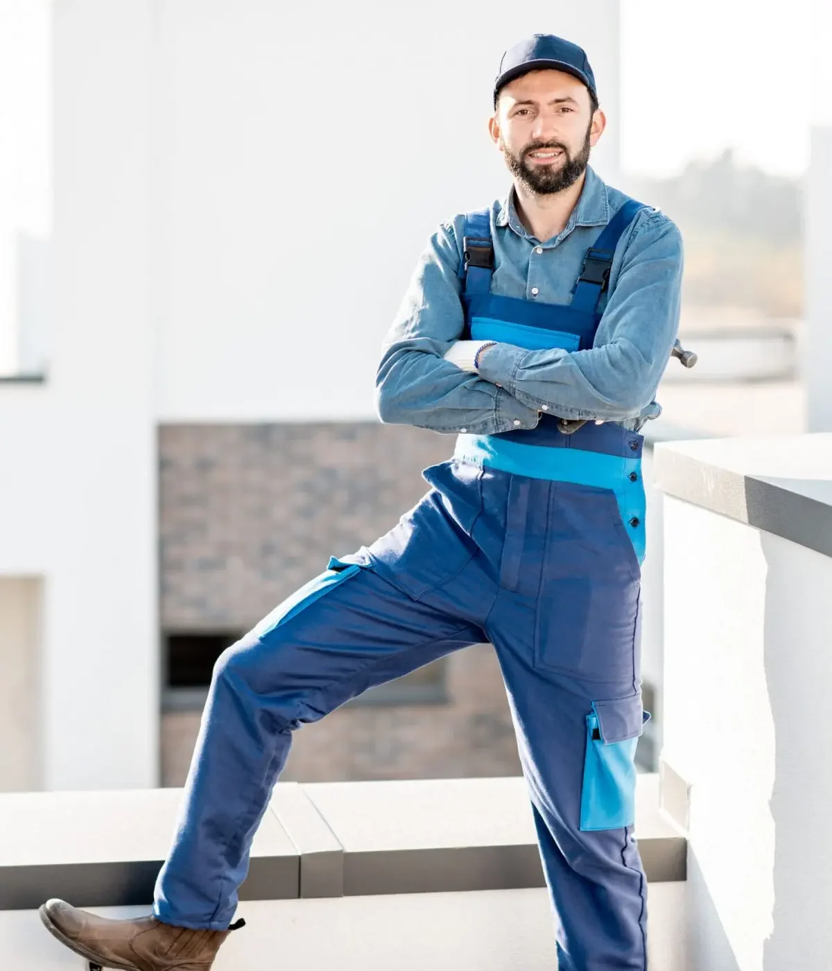 portrait-of-a-builder-in-uniform-on-the-roof-2023-11-27-05-26-12-utc-scaled-qxypfgqe66rjh2jg6ajd4x40ydsz3hhnt3ohmvtne8